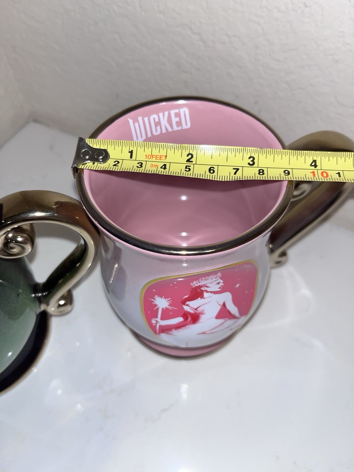 2-NWT Wicked Coffee/tea Green, Pink With Gold Handle Mug Set