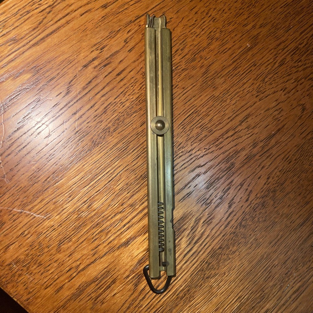 Brass straight-line percussion capper