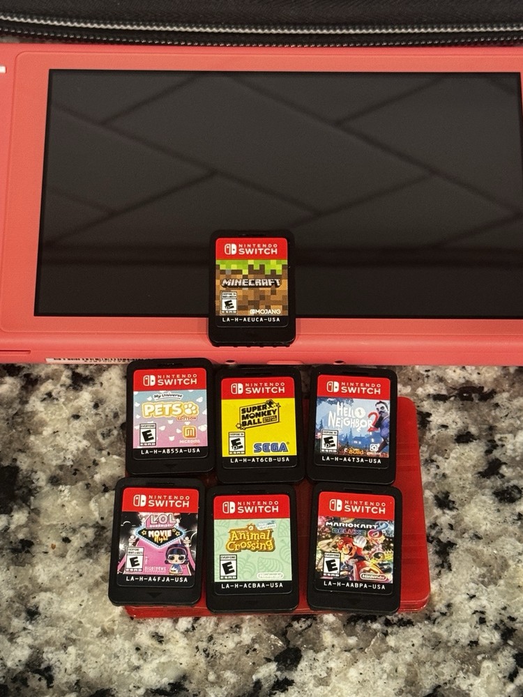 Nintendo Switch with games and controller