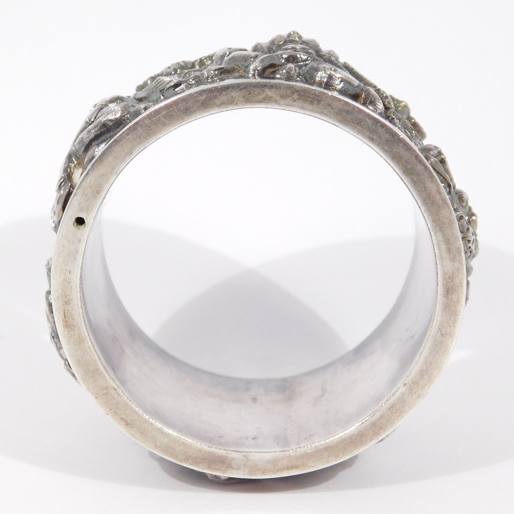 ORNATE REPOUSSE ASIAN SILVER FIGURAL NAPKIN RING