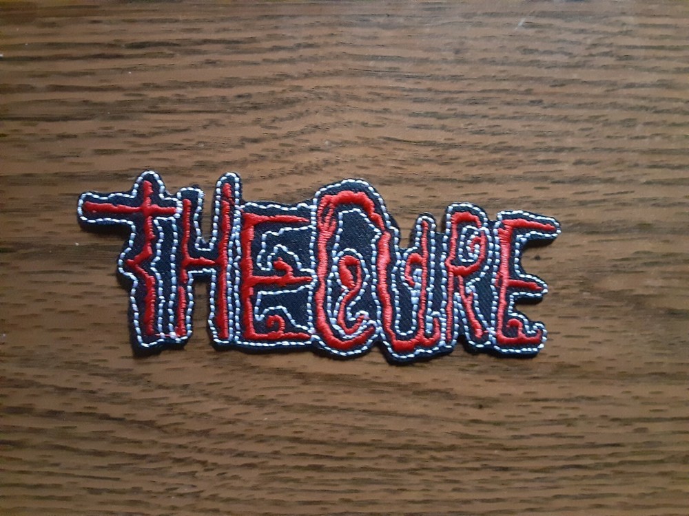 THE CURE,IRON ON RED AND WHITE EMBROIDRED PATCH