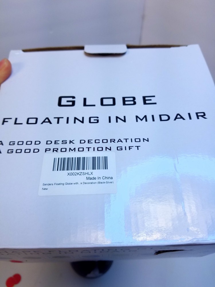 Globe Floating In Midair Black Globe Silver Map Light