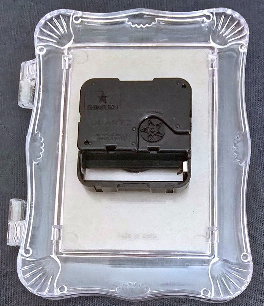 Older Plastic Standing Clock and Photo Holder