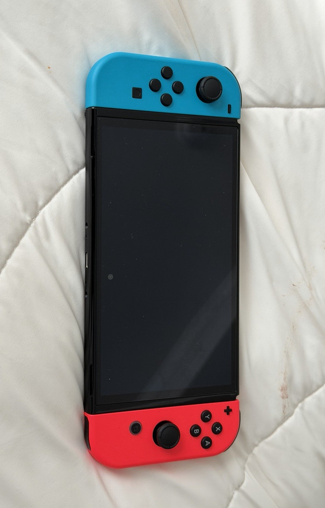 Nintendo Switch with Joy-Cons, Dock, Grip, Carrying Case