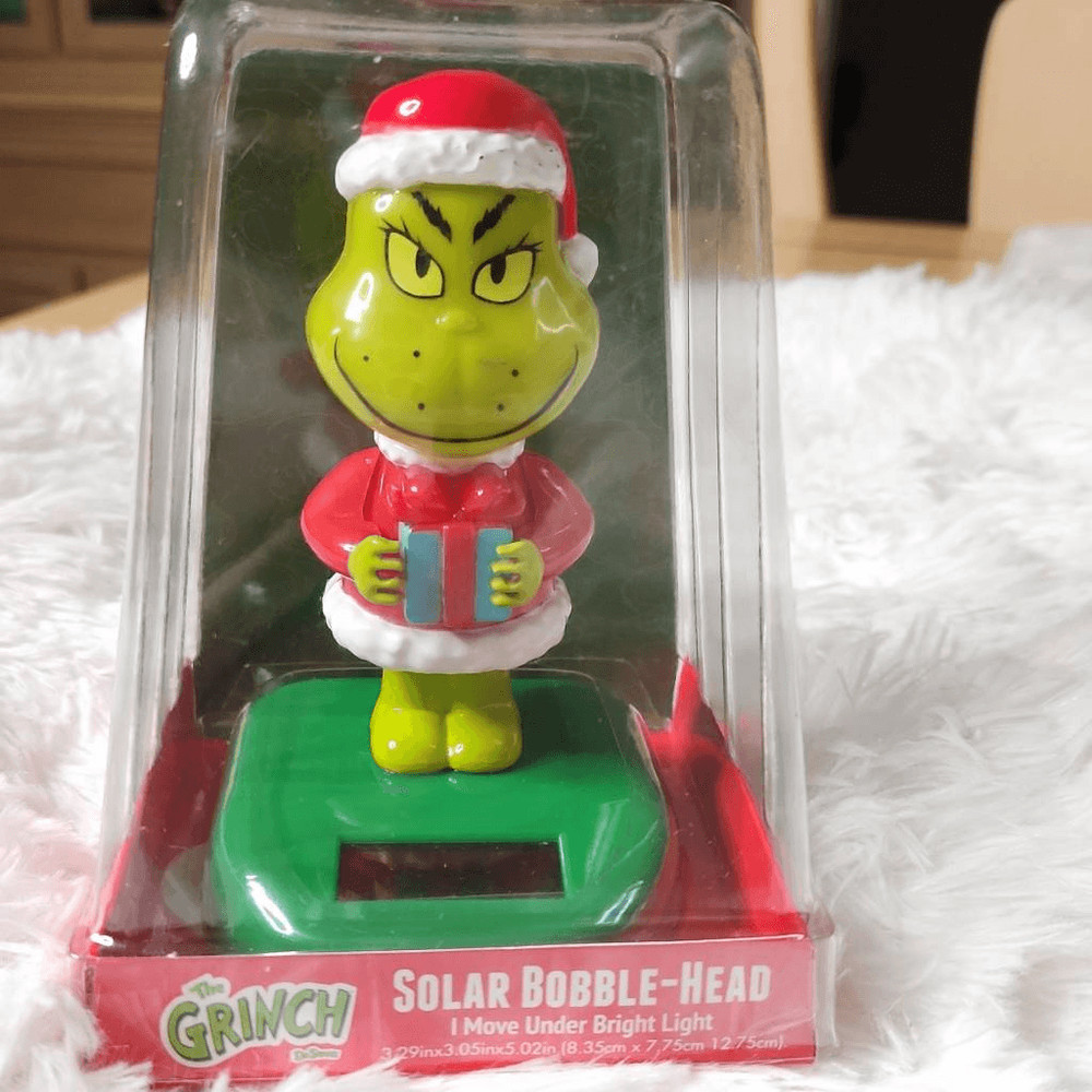 The Grinch solar Christmas bobblehead