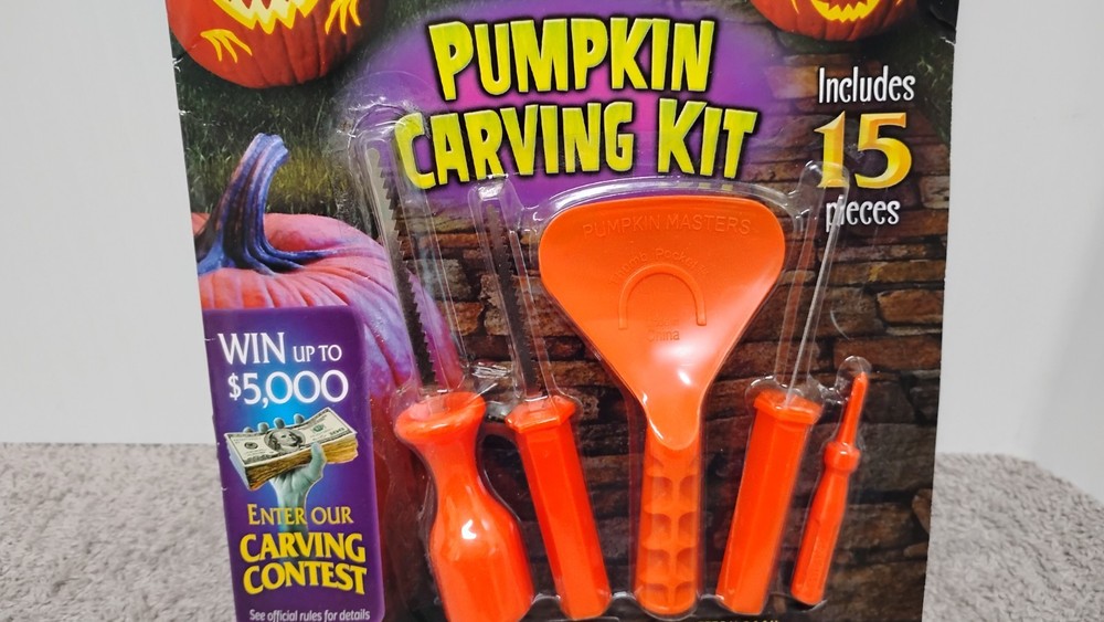2 Pumpkin Masters Pumpkin Carving Kit includes 5 tools and 14 patterns. (00)