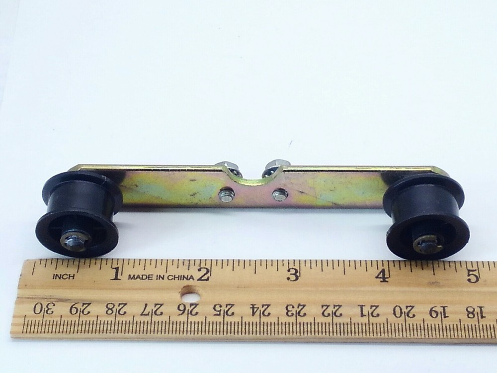 ROWE AMI CD JUKEBOX  ROLLER BRACKET ASSEMBLY PART #21089401
