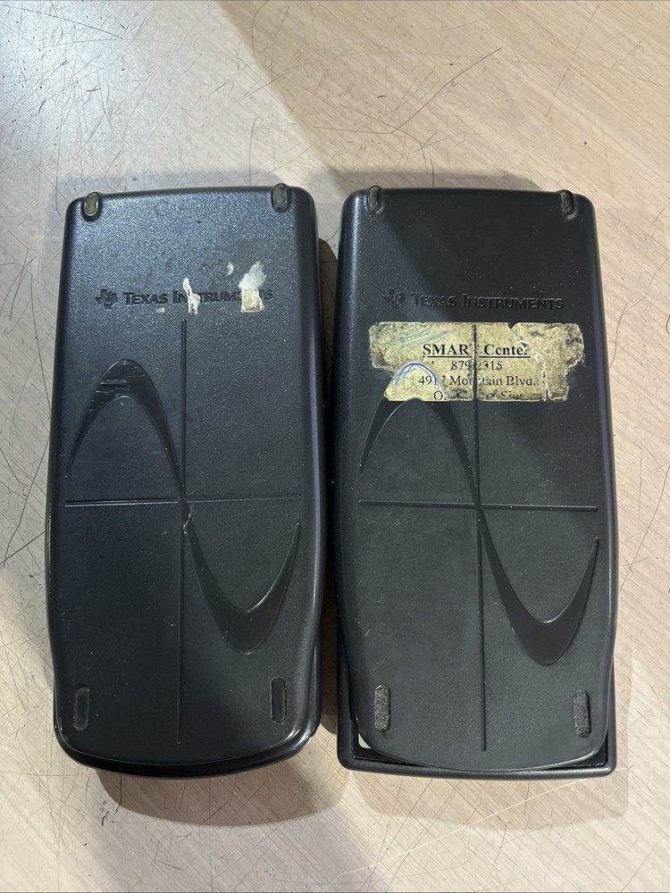 x2 TEXAS INSTRUMENTS TI-83 PLUS GRAPHING CALCULATOR