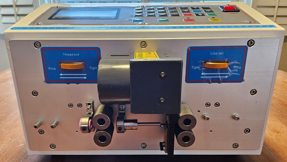 AUTOMATIC COMPUTER WIRE STRIPPING MACHINE