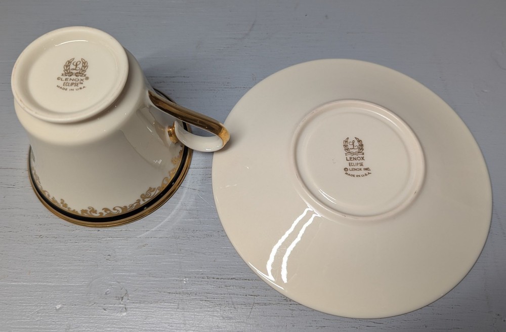 Tea cup and 6" saucer Lenox china Eclipse pattern ivory cream gold