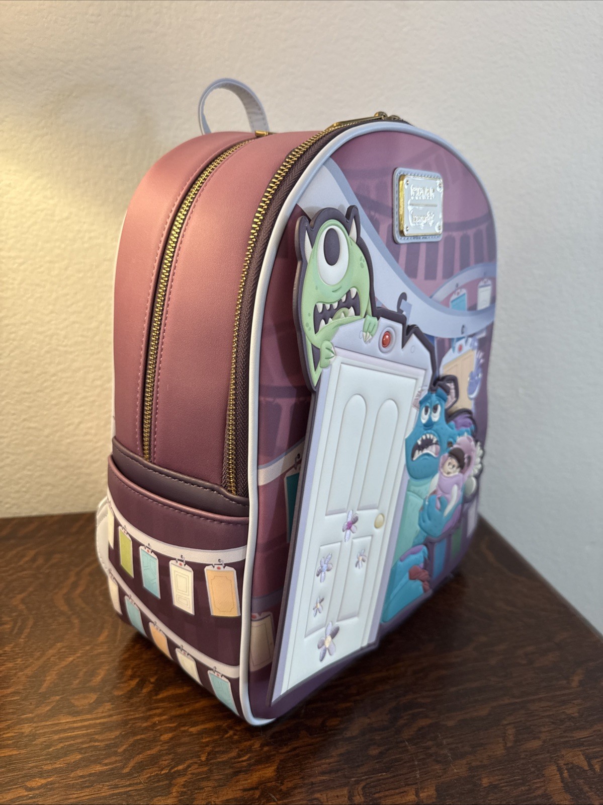 Loungefly Disney Pixar Monsters, Inc. Door Scene Mini Backpack NWT