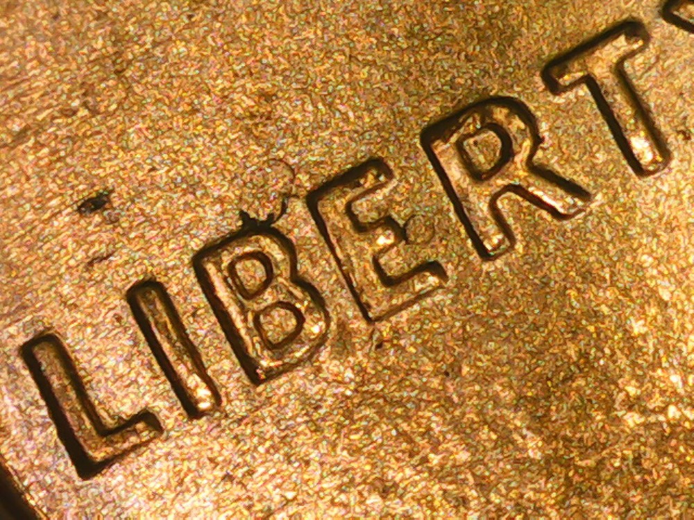 1995 Penny Die Chips Obverse, "BIE" error.