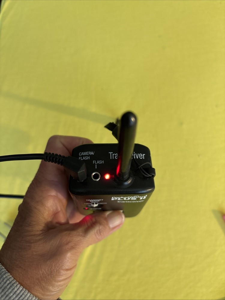 PocketWizard Plus II Transceiver Plus Stroboframe And Neewer Remote.