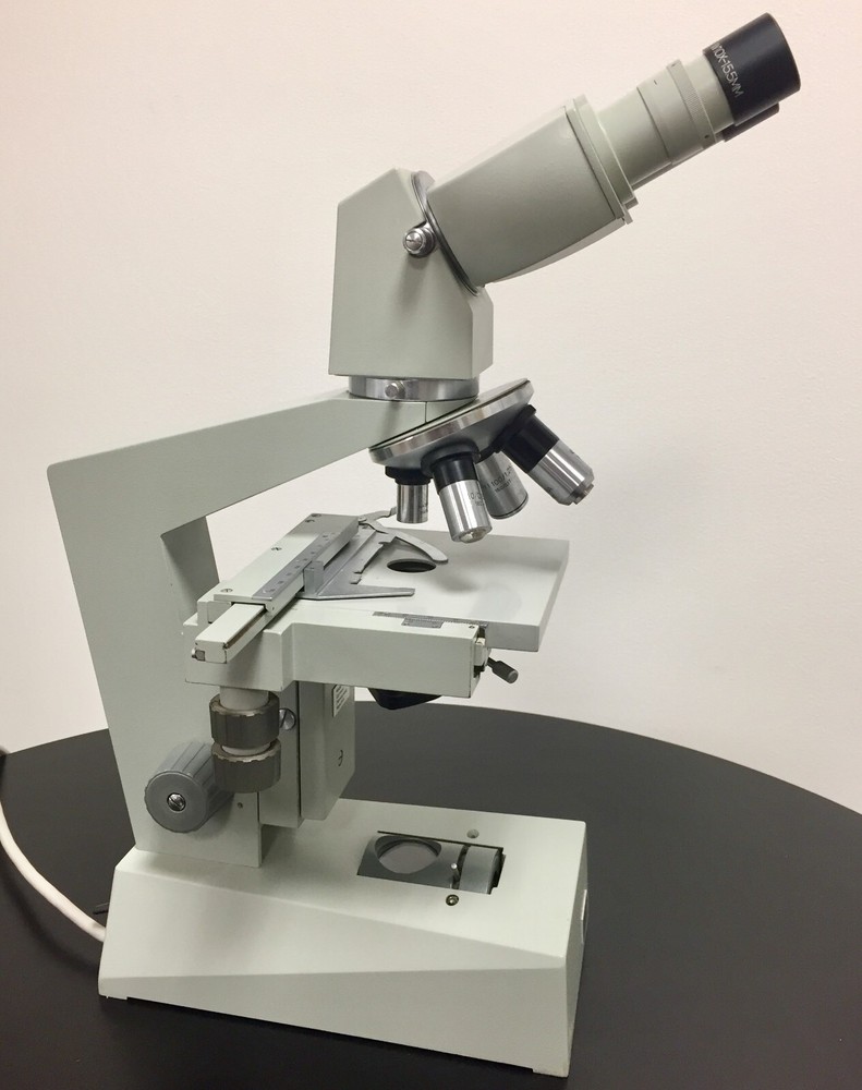 ZIESS ausJENA Microscope with 4 Objectives and light source