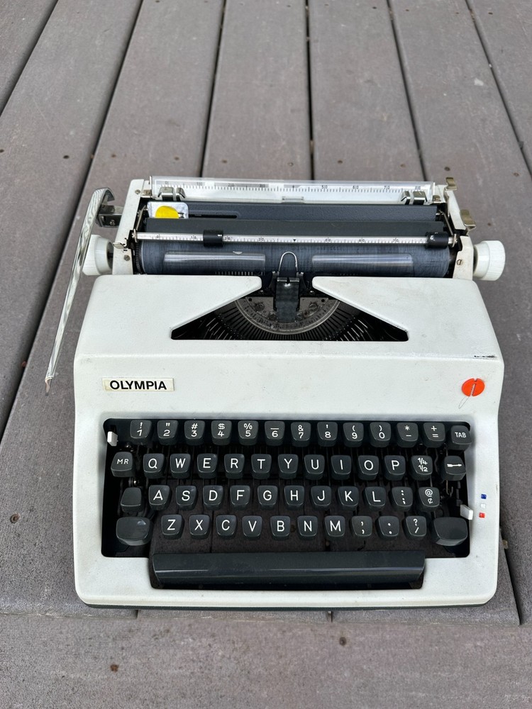 Olympia SM9 Portable Typewriter with case