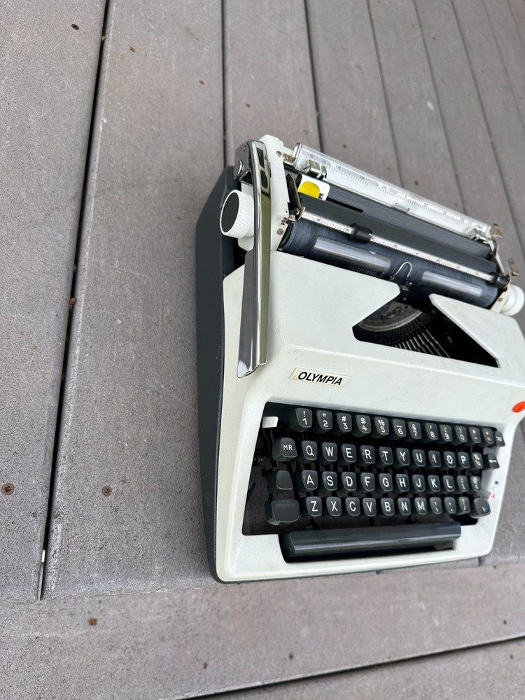 Olympia SM9 Portable Typewriter with case