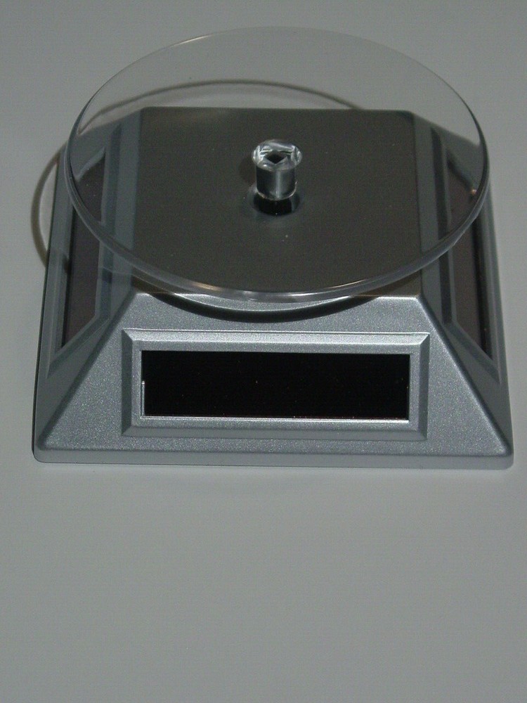 **REDUCED** SOLAR POWERED ROTATING DISPLAY BASE - silver
