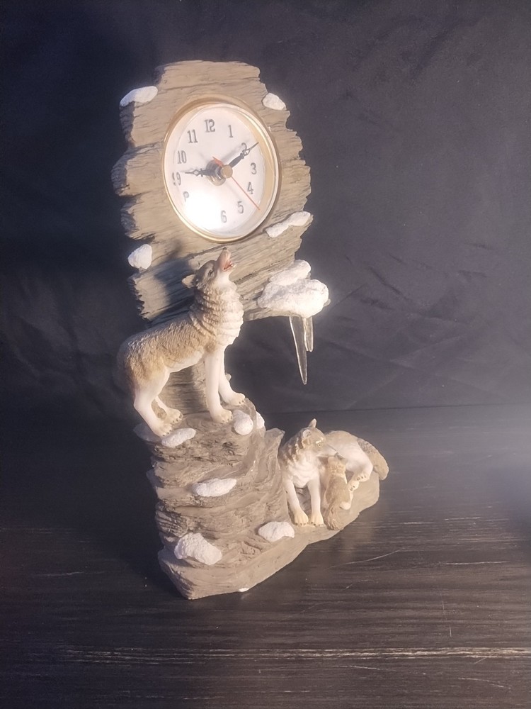 wolf clock missing ear and ice