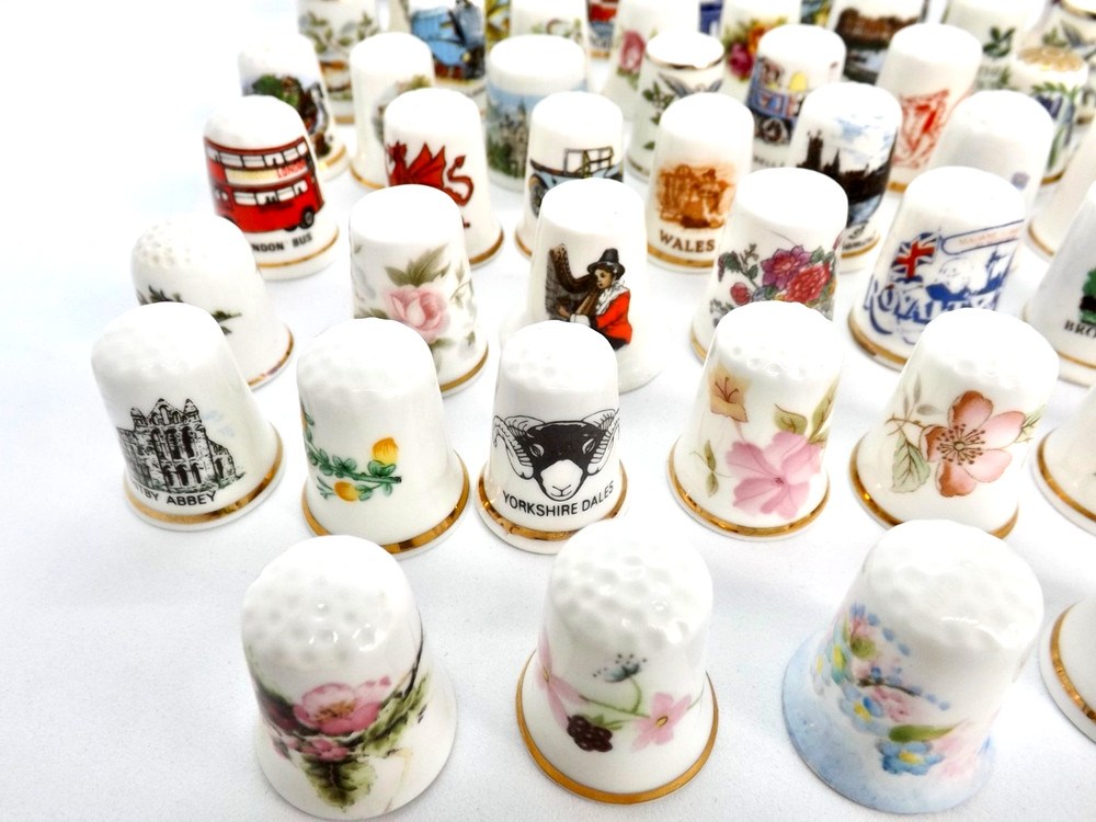 63 Thimbles Perfect Condition