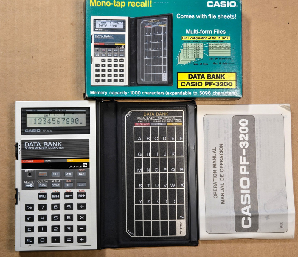 Casio PF-3200 DATA BANK Super Memory Computer / Calculator MINT in Box Works