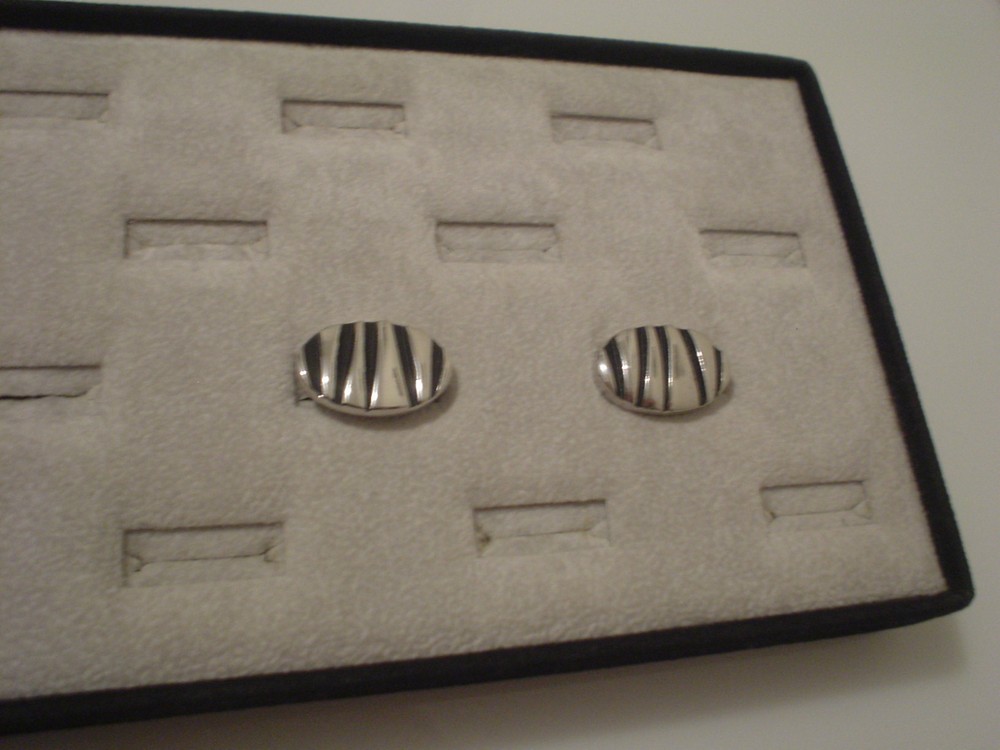 oval silvertone & black oval cufflinks