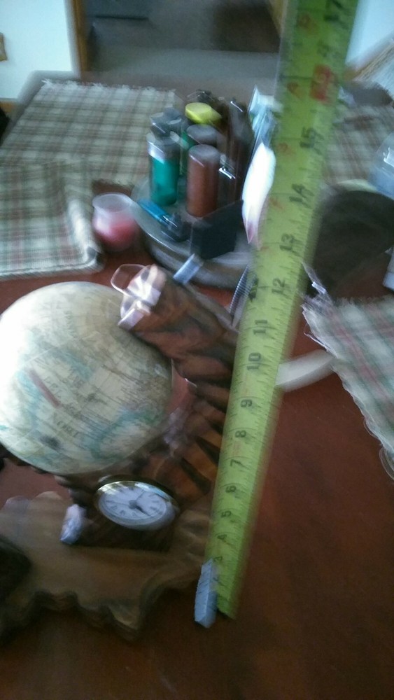 A Very Ornate Desktop Globe With Quartz Clock