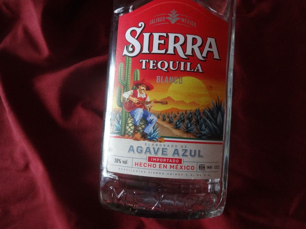 Two empty Sierra Tequila bottles- Blanco and Silver (superb condition)