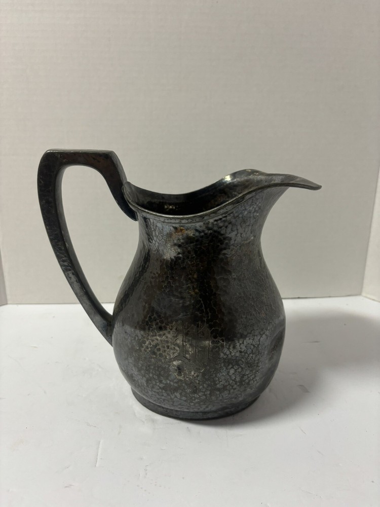 Silver antiqued distressed pitcher