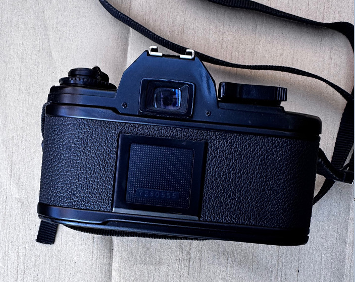 Nikon EM -35mm Camera and Nikon SB-E Flash with cases