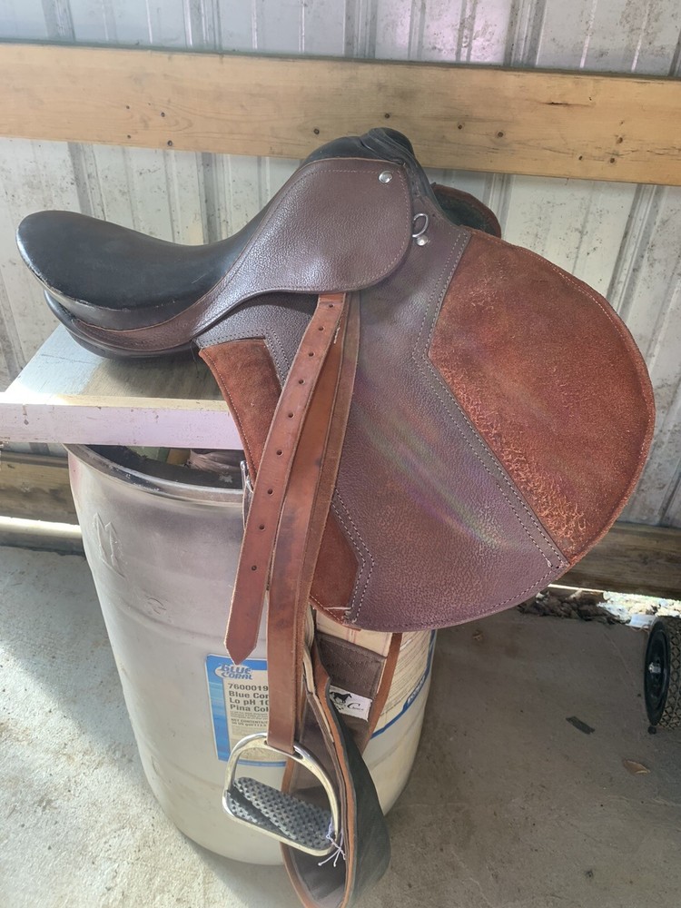 english horse saddle with stirrups