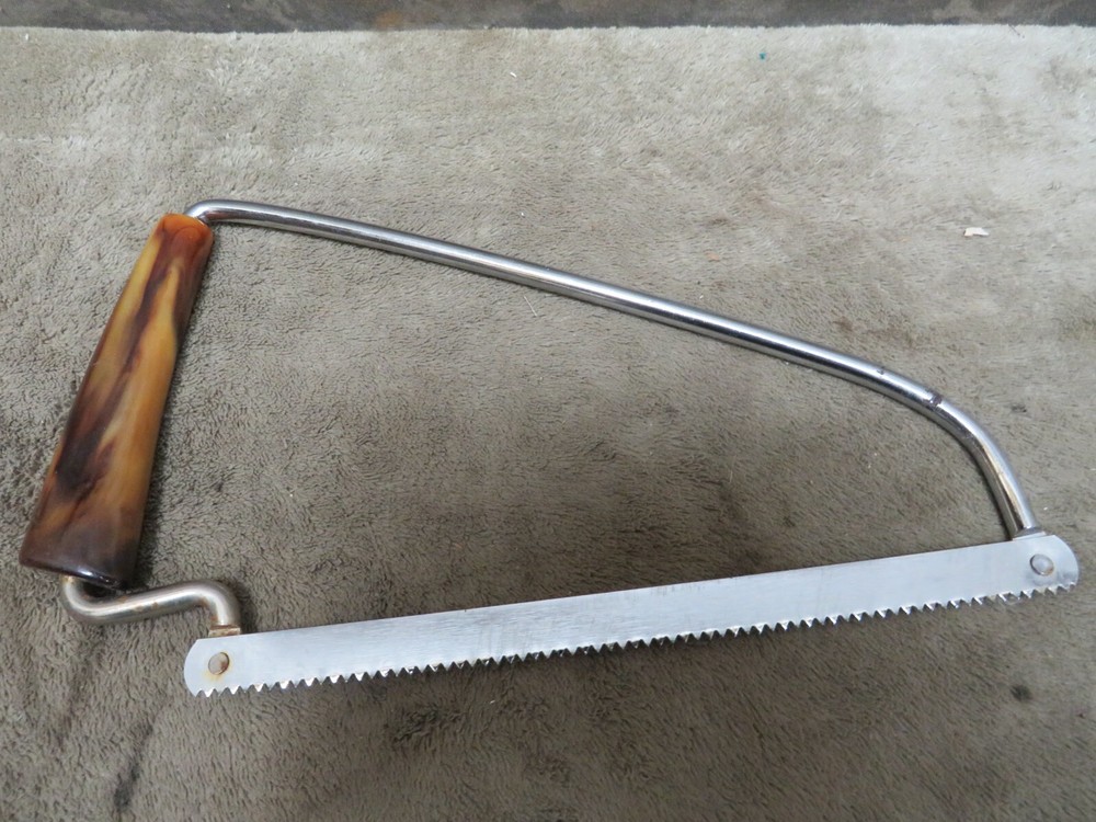 Vintage Bakelite Tortoise Shell Handle BONE SAW