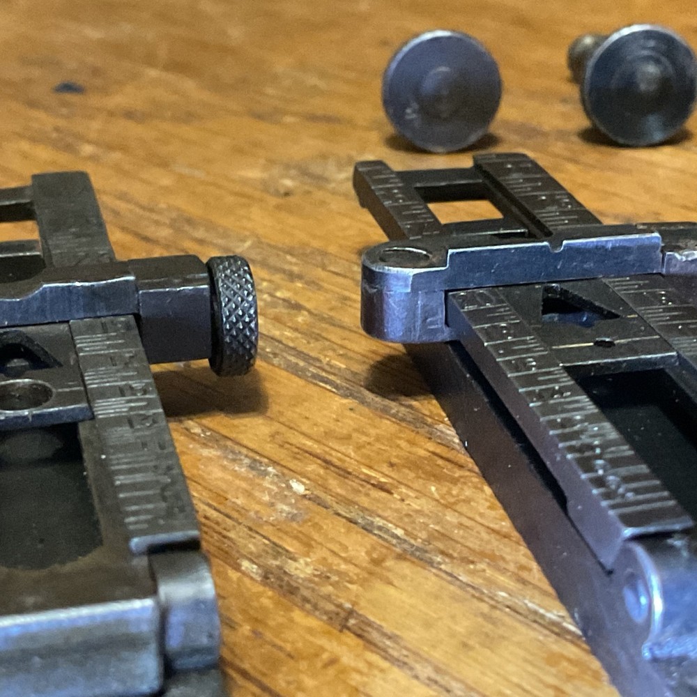 Remington 1903 sight base, leaf, slide, elevation, windage knobs marked R. 1 set