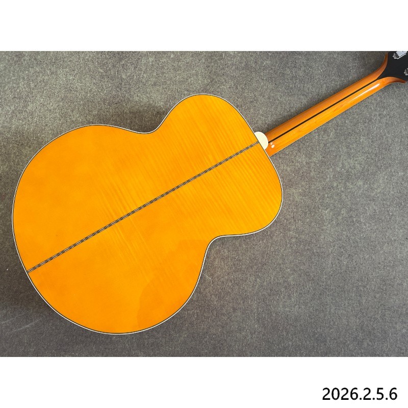 Acoustic guitar yellowish Solid spruce board top maple back and side
