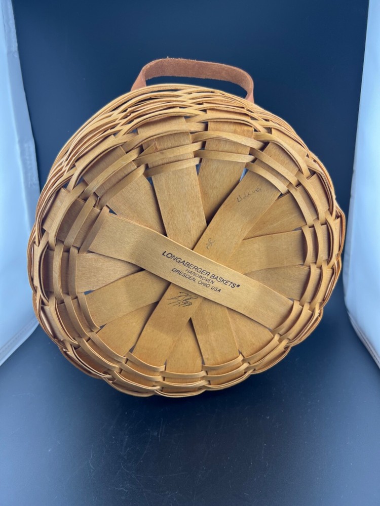 Round Longaberger Serving Basket with divided plastic protector. excellent condi