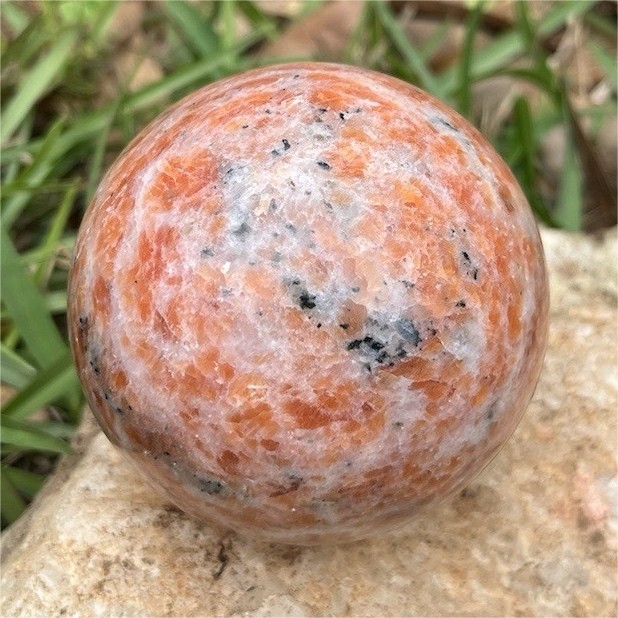 Sunstone Healing Sphere Mineral Display