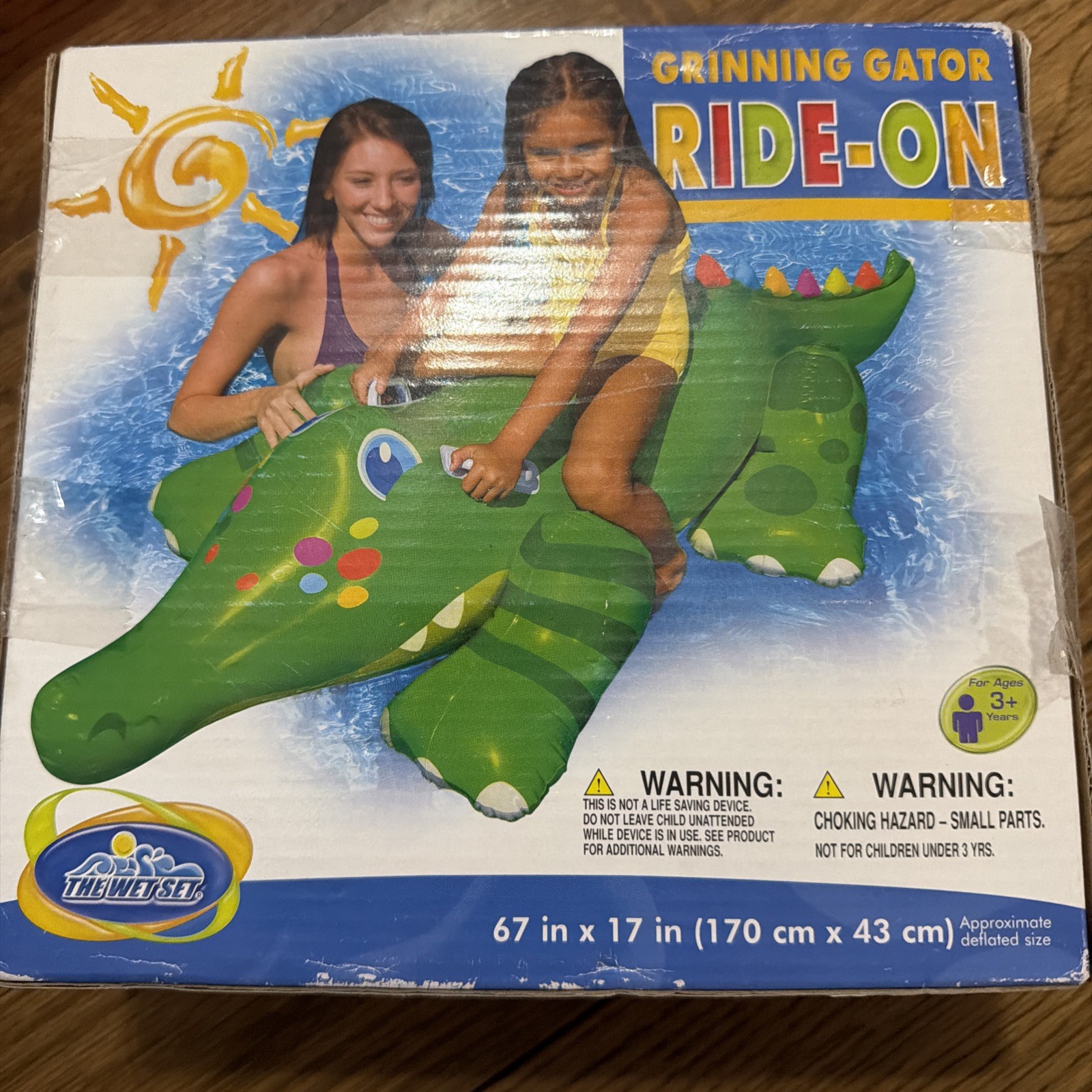 The Wet Set Grinning Gator Ride On Float -67x17” Never Opened - Vintage 2009