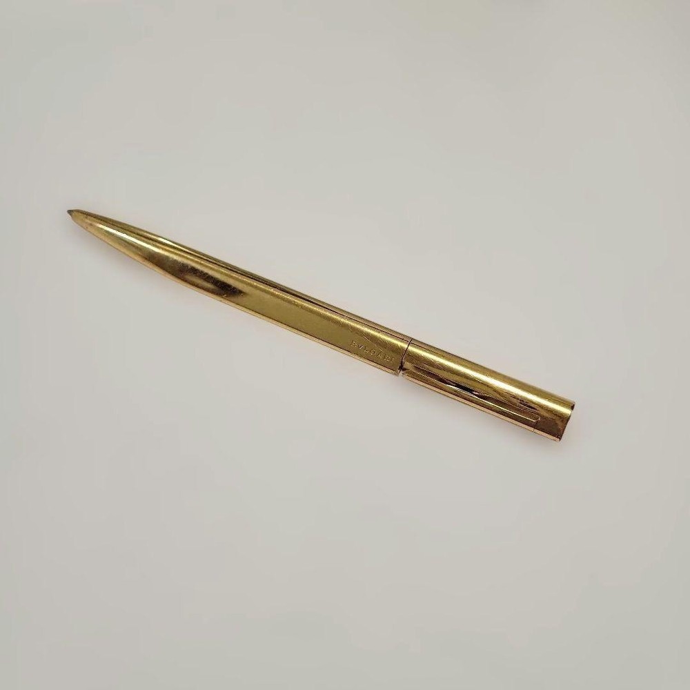 Gold twist ballpoint pen #b45d04