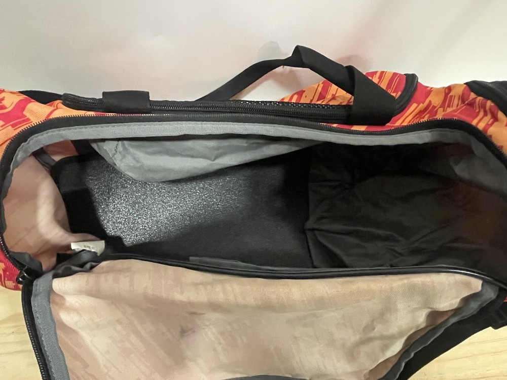 Nike Duffel Bag in an Orange Red Checkered Pattern- 16 X 9