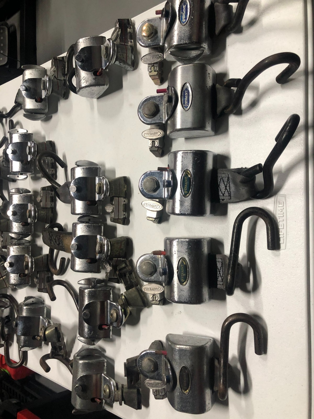 Q'Straint Wheelchair Securement tie Down Retractors.