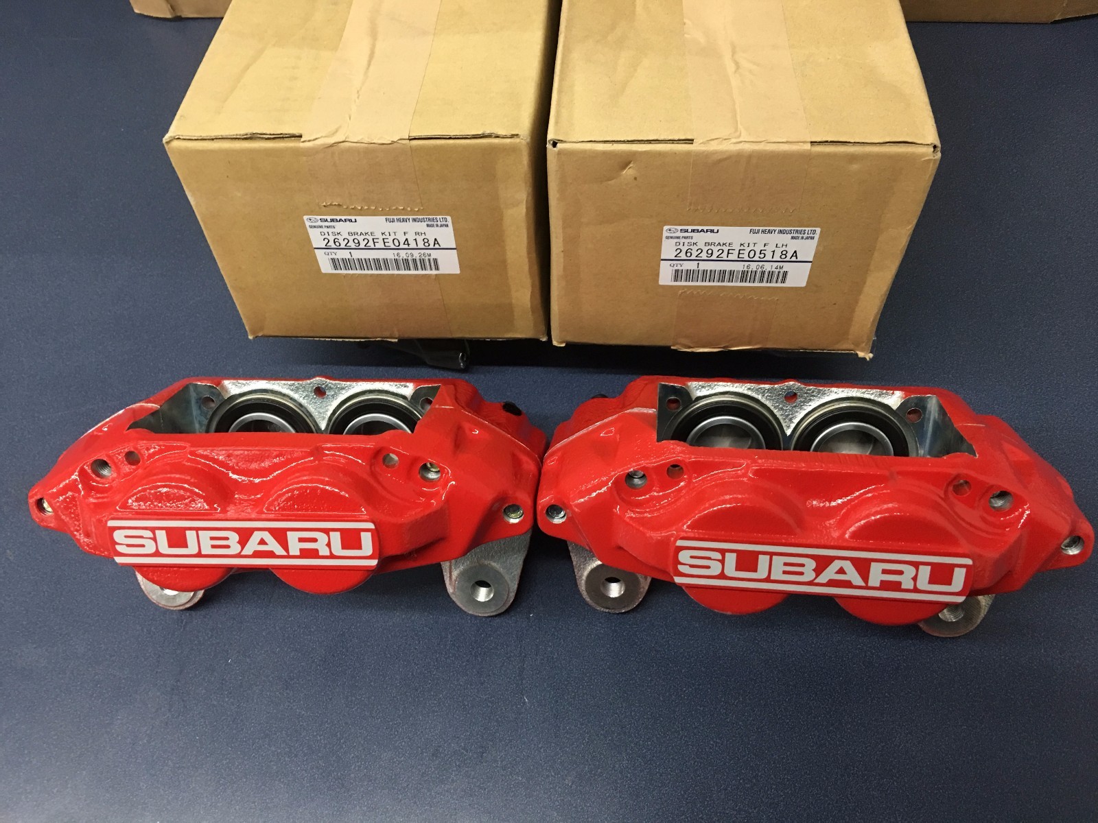 Genuine SUBARU WRX OEM RED SUBARU 4 PISTON BRAKE CALIPER Front Set Pair 2006-07