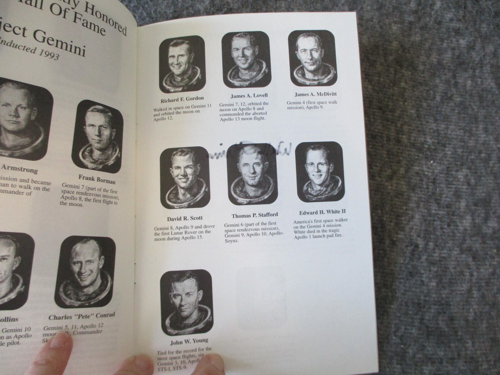 NASA APOLLO ASTRONAUT INDUCTION PROGRAM SIGNED BY WALTER M. SCHIRRA + PEN