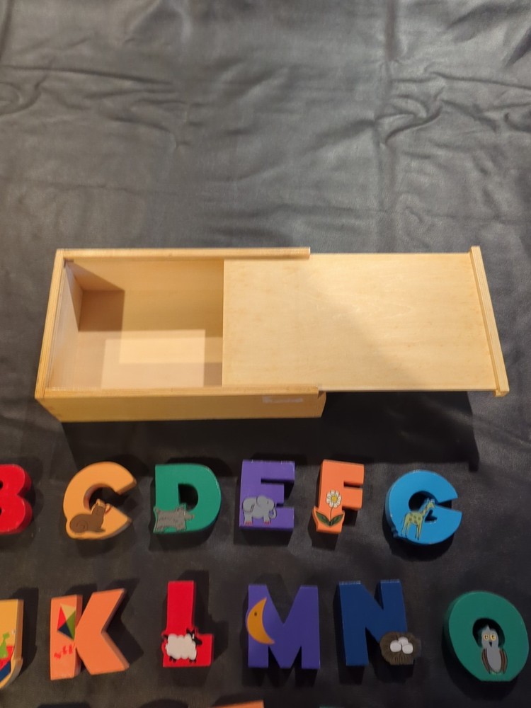 Solid wood alphabet letters in wood case