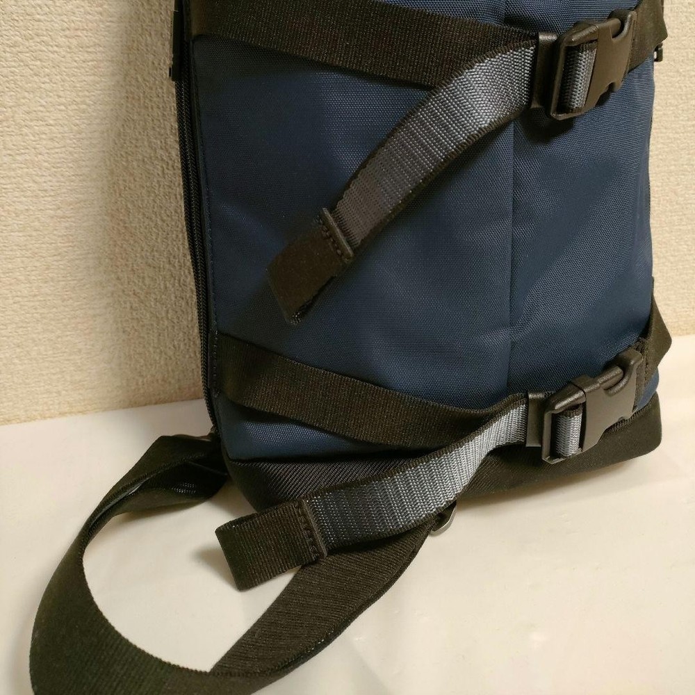 TUMI body bag slingback