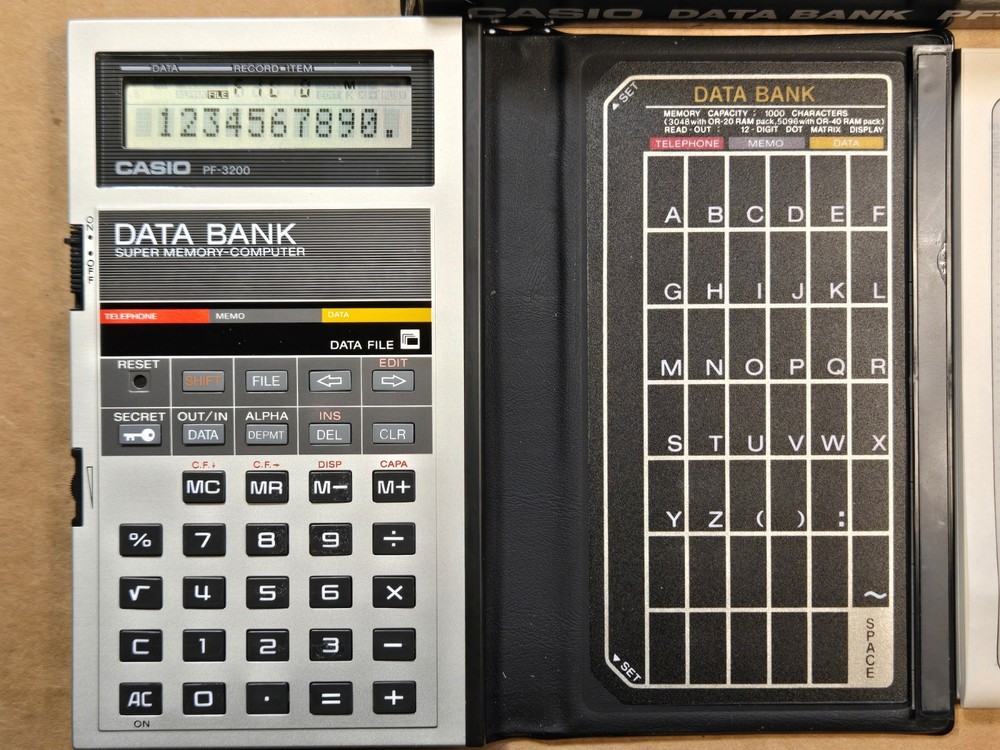 Casio PF-3200 DATA BANK Super Memory Computer / Calculator MINT in Box Works