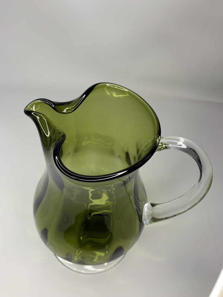 hand blown green footed 10 1/2" pitcher & applied clear handle