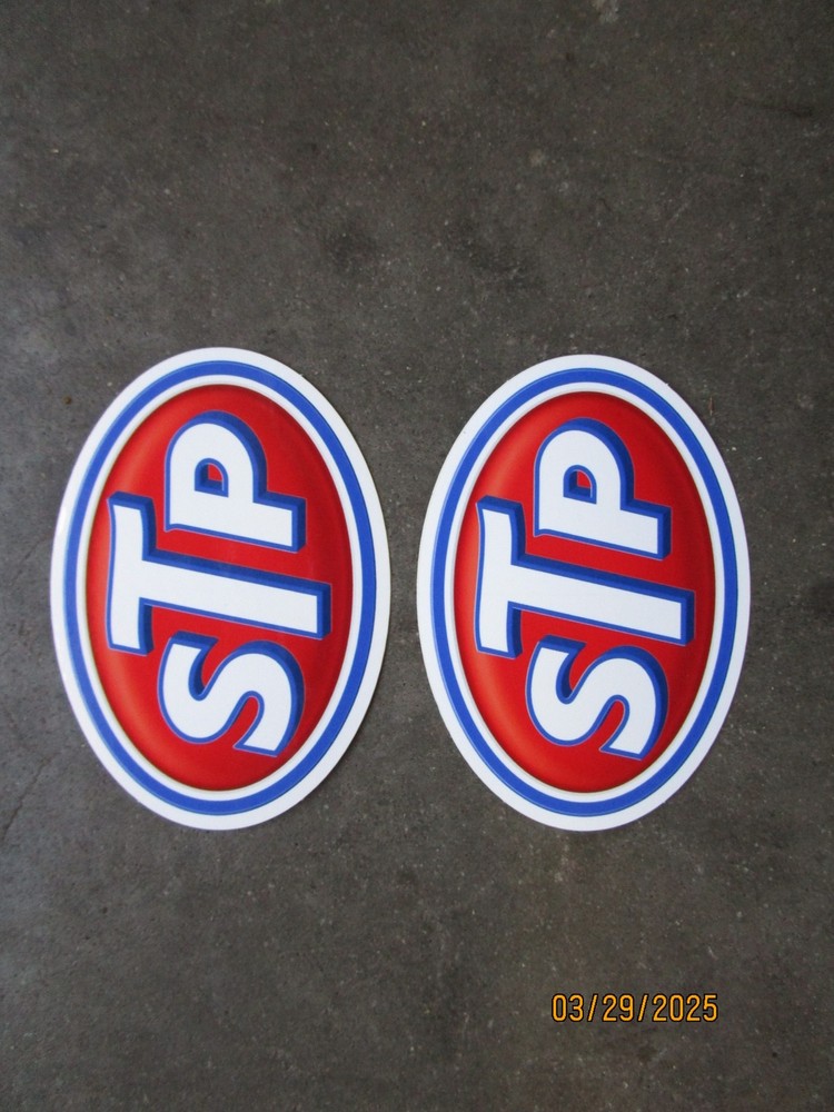 2 STP Oil Stickers 4"