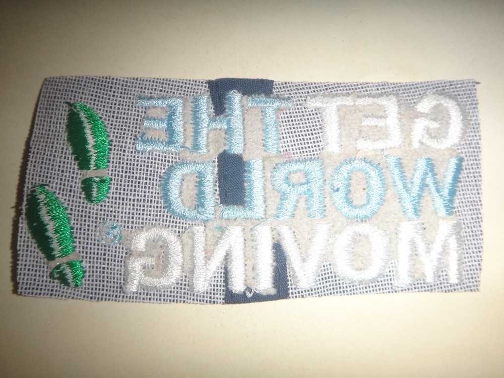 Slogan GET THE WORLD MOVING Machine Embroidered Patch