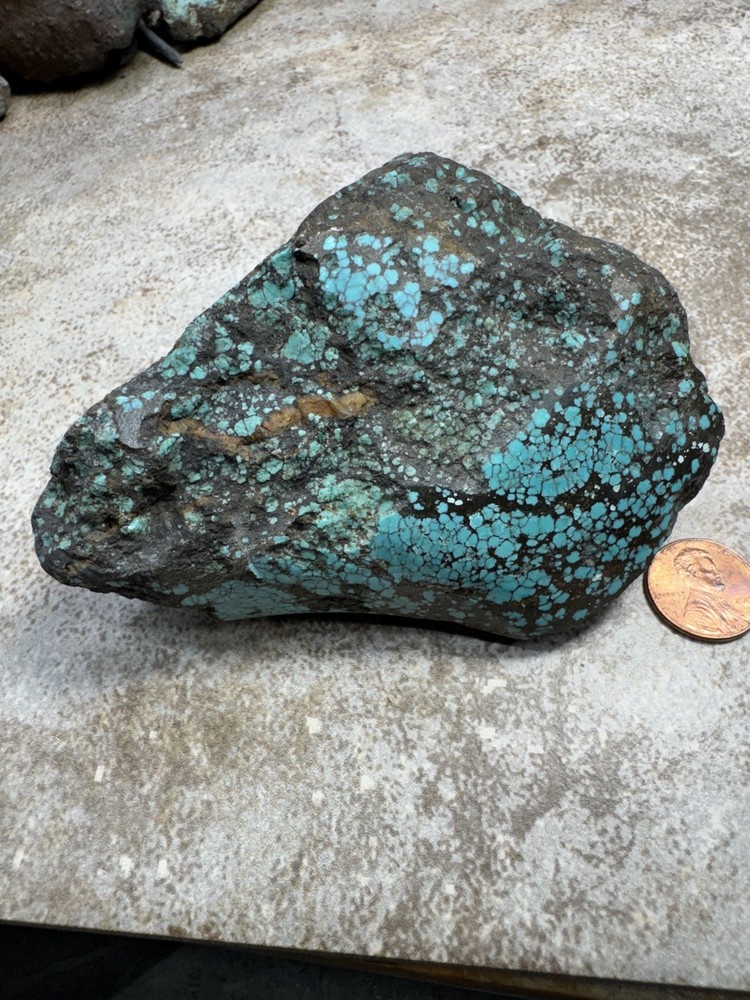 Hubei turquoise rough , solid spiderwebs nuggets in blue color tight pattern