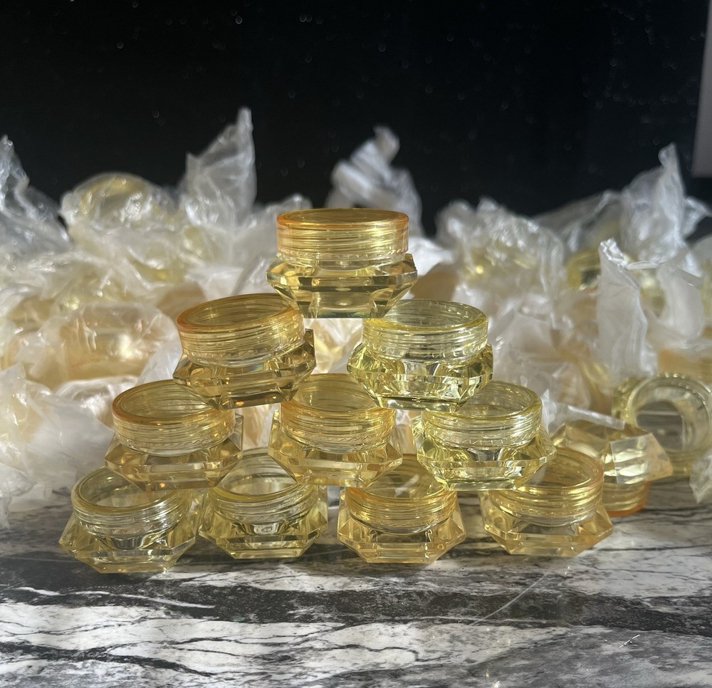 Yellow refillable diamond shaped bottles