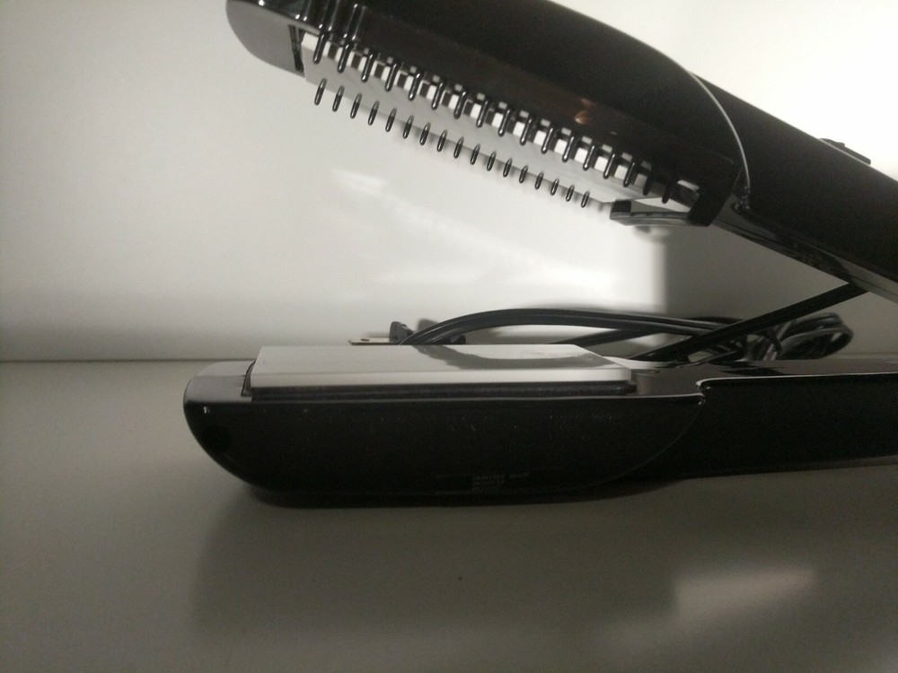 Premier Professional ceramic straighting iron. With removable guide teeth Curle